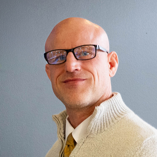 Headshot image of Caleb Bryant.