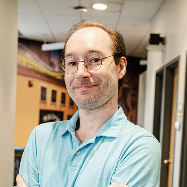 Headshot image of Daniel Hogan.