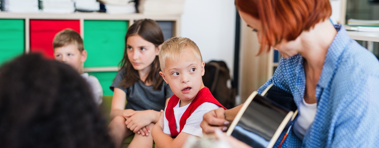 Preschool teacher and students