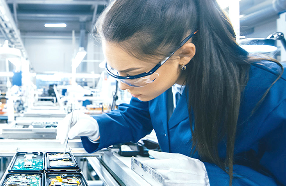 Woman working in electrical lab
