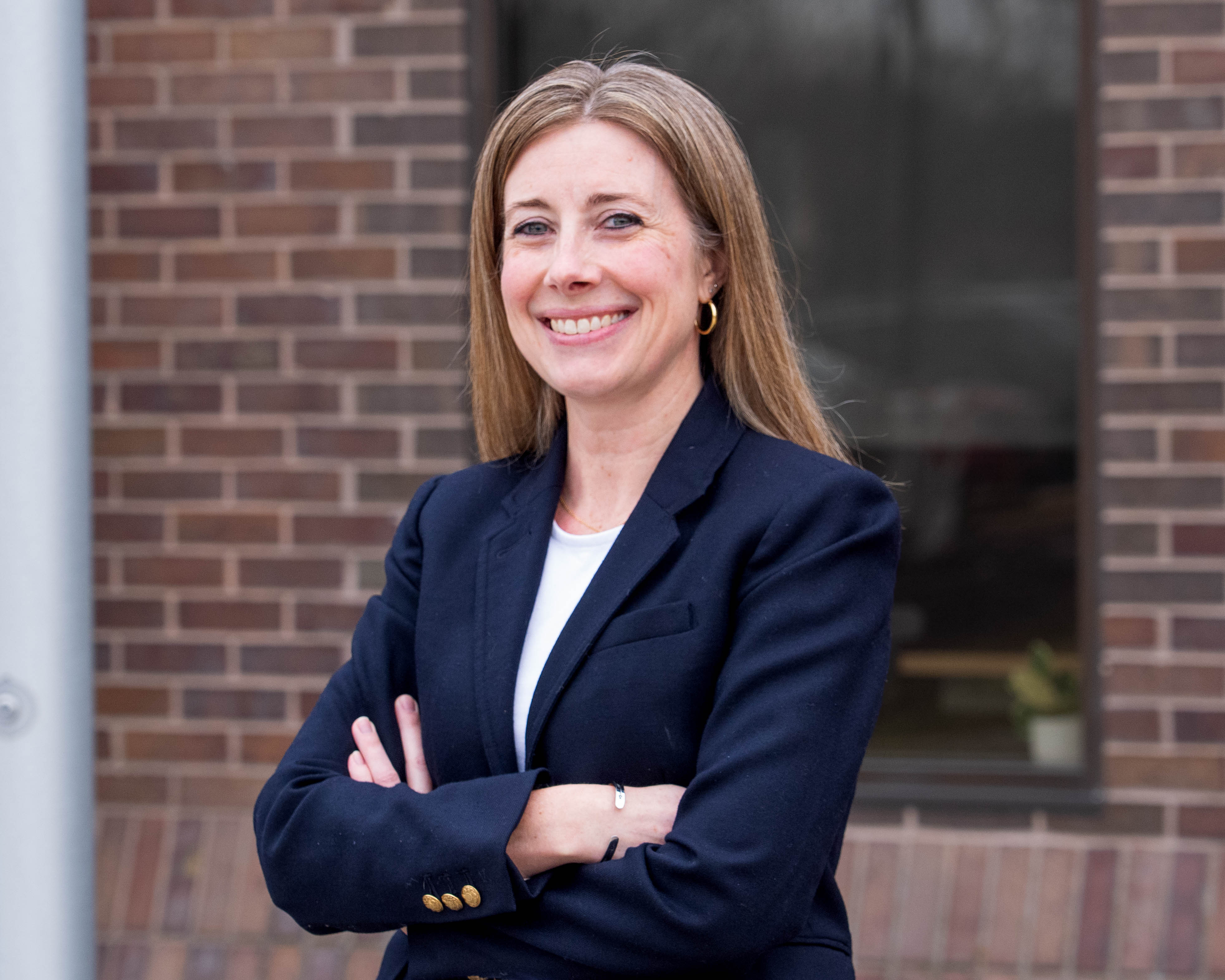 woman leaning against wall