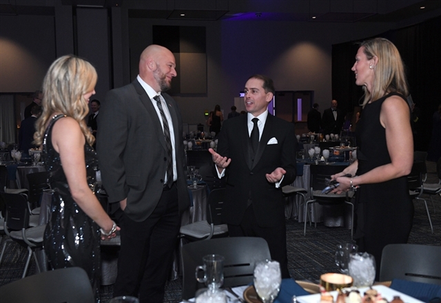 Guests interacting at gala event