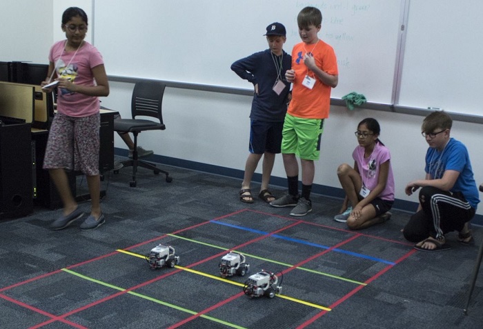 Students doing activity at LEGO summer camp